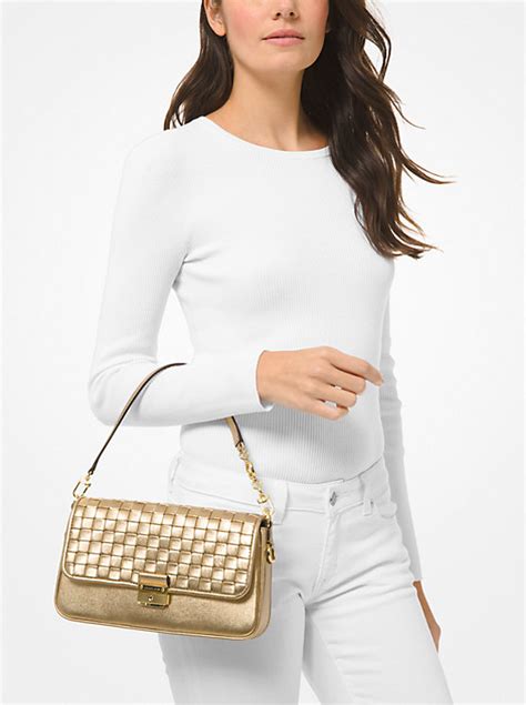 michael michael kors bradshaw small woven leather shoulder bag|michael kors bradshaw camera bag.